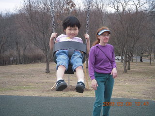 Cecelia and Betsy at the swings