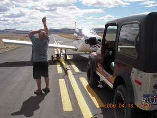 N4372J at Canyonlands (CNY) - flat tire - Gary watching skydivers