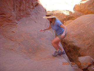 99 6uk. Arches National Park - Fiery Furnace hike - hiker crossing