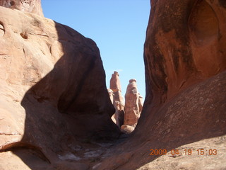 Arches National Park - Fiery Furnace hike - hikers squeezing