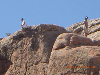 Arches National Park - Devil's Garden hike - two fellows atop Double-O Arch