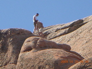 74 6ul. Arches National Park - Devil's Garden hike - two fellows atop Double-O Arch