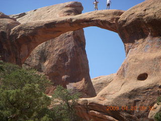84 6ul. Arches National Park - Devil's Garden hike - two fellows atop Double-O Arch