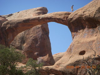 86 6ul. Arches National Park - Devil's Garden hike - two fellows atop Double-O Arch