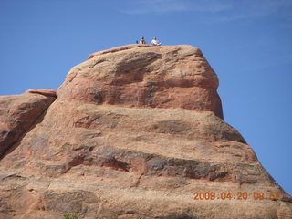 91 6ul. Arches National Park - Devil's Garden hike - two fellows atop Double-O Arch