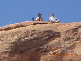 92 6ul. Arches National Park - Devil's Garden hike - two fellows atop Double-O Arch
