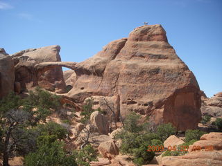 93 6ul. Arches National Park - Devil's Garden hike - two fellows atop Double-O Arch