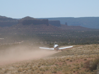 9 6un. Charles Lawrence photo - Charles and Adam taking off in N4372J at Fry Canyon - in-flight photo