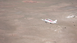 80 6ww. Markus's photo - meteor crater and N4372J in-flight photo