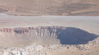 86 6ww. Markus's photo - meteor crater and N4372J in-flight photo