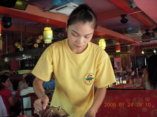 China eclipse - Yangshuo restaurant waitress
