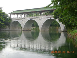 China eclipse - Guilin SevenStar park - flower bridge