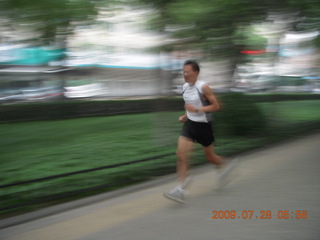 China eclipse - Beijing morning run - runner