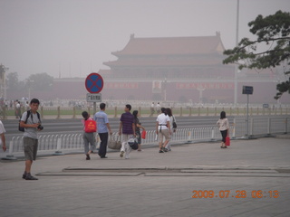 China eclipse - Beijing morning run - porta-potty holes in sidewalk