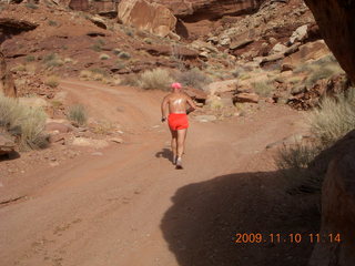 Lathrop trail hike - Adam running - back