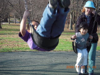 Gaby, Betsy, and Cecelia on swings