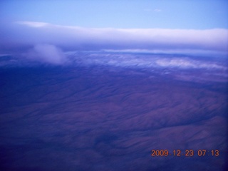 3 72p. aerial - pre-dawn clouds and mountains