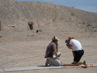 Gila Bend (E63) fly in - at the range - Adam shooting rifle at bomb