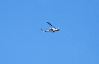 Bagdad (E51) mine tour - repair facility - Kristina and Sean taking a picture