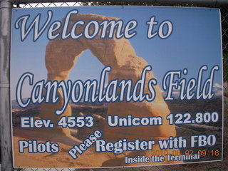 75 772. sign 'Welcome to Canyonlands Field' CNY