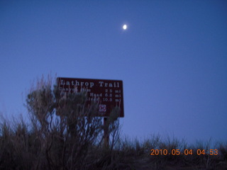 2 774. Canyonlands Lathrop Trail hike - pre-dawn sign with moon