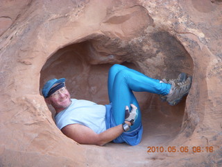 40 775. Arches National Park - Devil's Garden and Dark Angel hike - Adam in hole in the rock