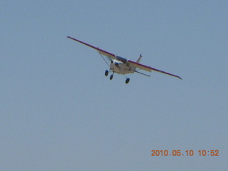 97 77a. Alamo Lake airstrip - landing airplane