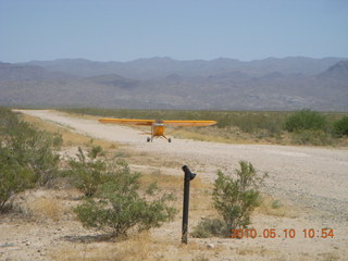 103 77a. Alamo Lake airstrip - landing airplane