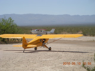 105 77a. Alamo Lake airstrip - landing airplane