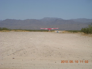 109 77a. Alamo Lake airstrip - landing airplane