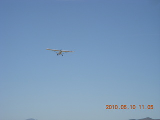 113 77a. Alamo Lake airstrip - landing airplane