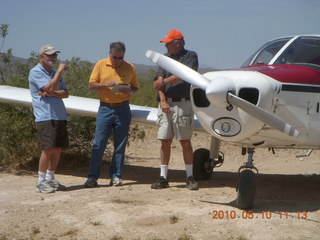 130 77a. Alamo Lake airstrip - people and N4372J