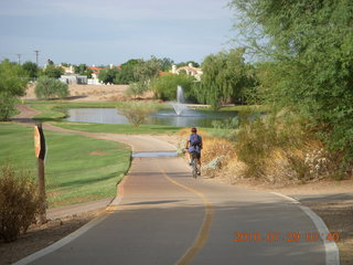 Adam riding bicycle on Green Belt in Scottsdale