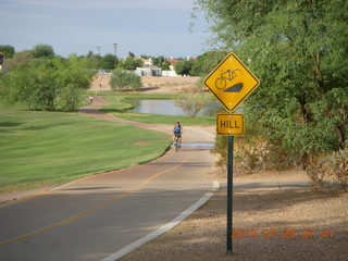 Adam riding bicycle on Green Belt in Scottsdale