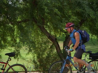 Adam riding bicycle on Green Belt in Scottsdale