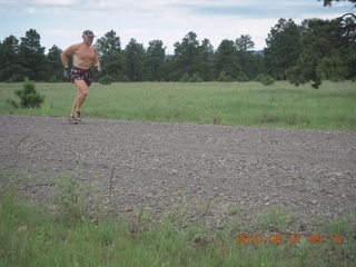 Lathrop trail hike - Adam running - back