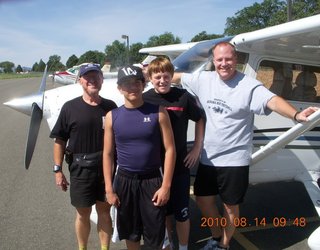 Adam ('Redbeard'), Juicejacket, Show-man, and Peter in front of N1206U