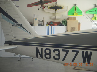 3 7b3. N8377W tail and model airplanes in Watkins hangar