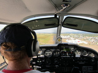 Bob and N8377W and Adam in Watkins hangar