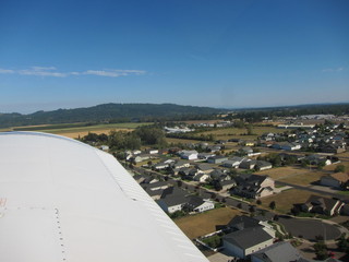 53 7b3. N8377W takeoff Independence (7S5) climbout