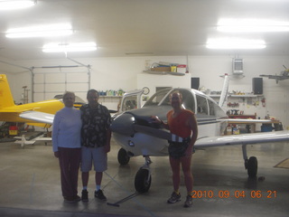 73 7b4. Judy, Bob, N8377W, and Adam in Watkins hangar