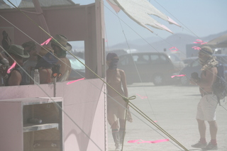 7S5 to DVT trip - Nevada - Black Rock City - Burning Man entrance - woman with face protected