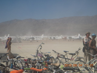 7S5 to DVT trip - Nevada - Black Rock City - Burning Man entrance - woman with face protected