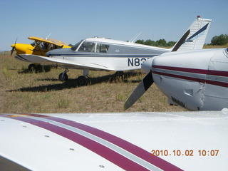 144 7c2. airplanes at Me-Own airstrip - including N8377W