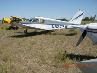 145 7c2. N8377W and other airplanes at Me-Own airstrip