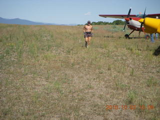 1313 7c2. Adam running at Me-Own airstrip with airplanes around