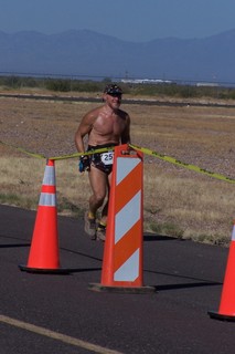 1323 7cw. Safford fly-in and half marathon - Ken's photo - Adam running, finishing