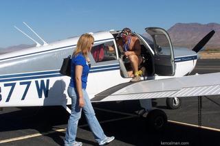 187 7cw. Safford fly-in and half marathon - Ken's photo - Bonnie abnd Adam getting into N8377W