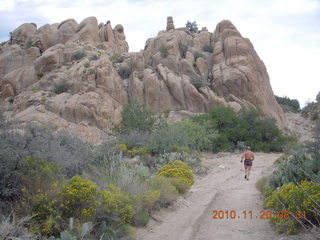 Canyonlands Lathrop Trail hike - Adam running on white rim road - back