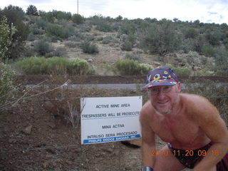 Adam on Bagdad run - Active Mine area sign